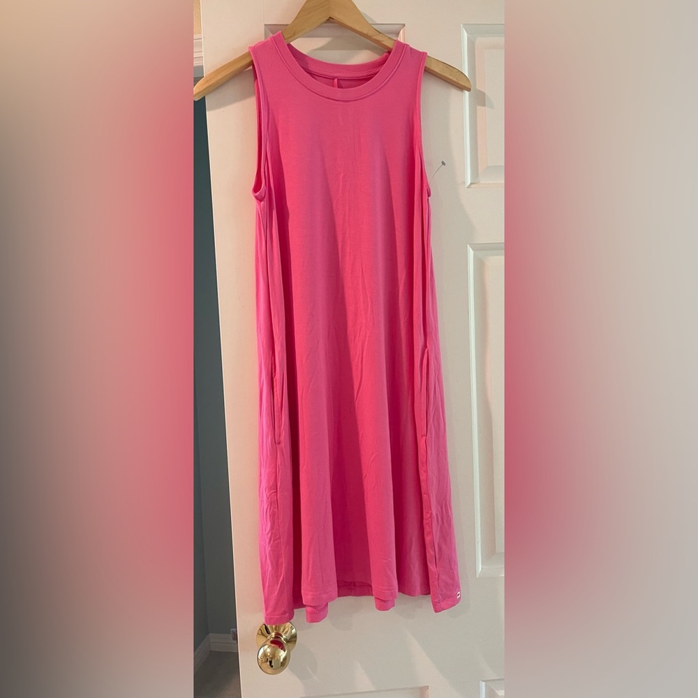 Sleeveless pink sundress or swimsuit cover up